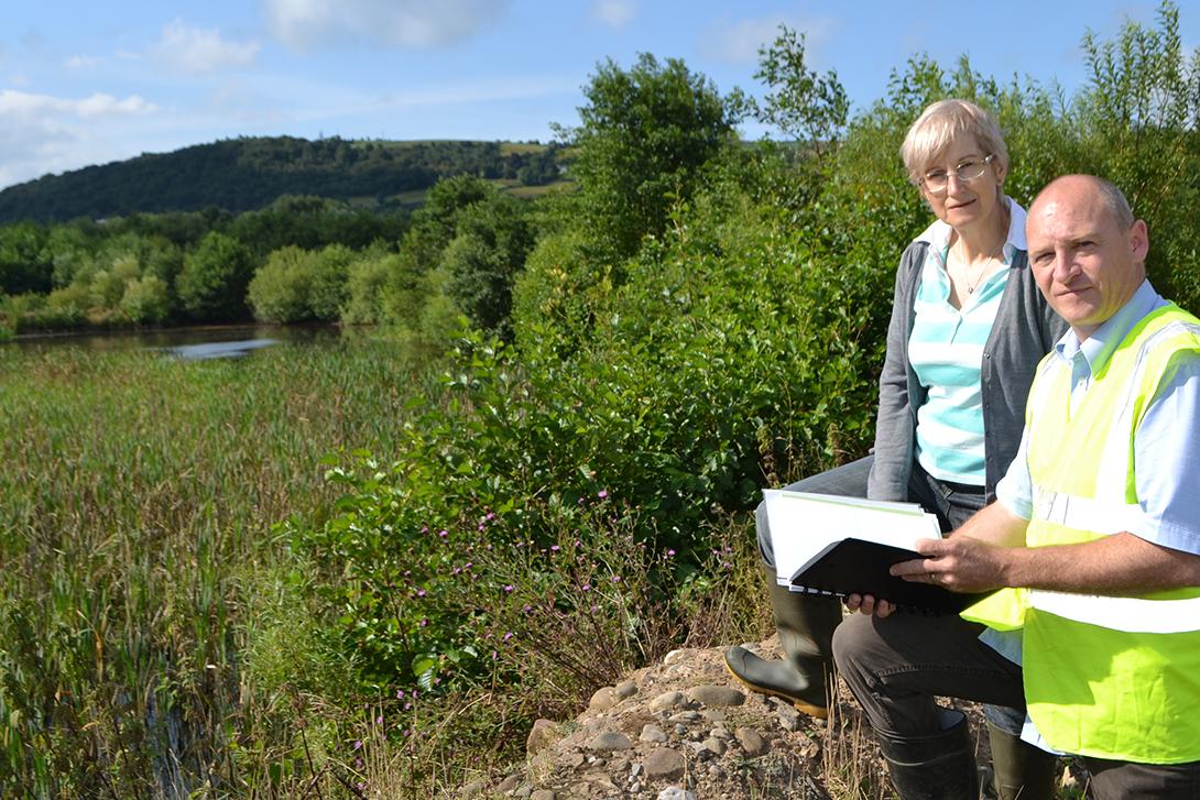 Paul Hartson discusses the fort plans with fellow Park in the Past director Amanda Brewer.